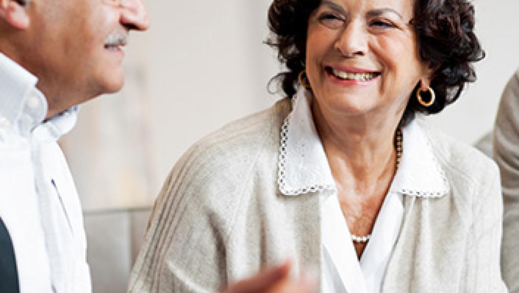 mature woman smiling at family member