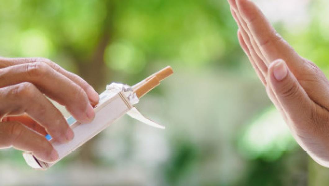 hand gesture turning down cigarette 