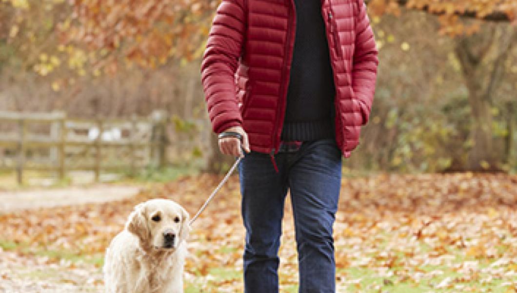 man walking his dog