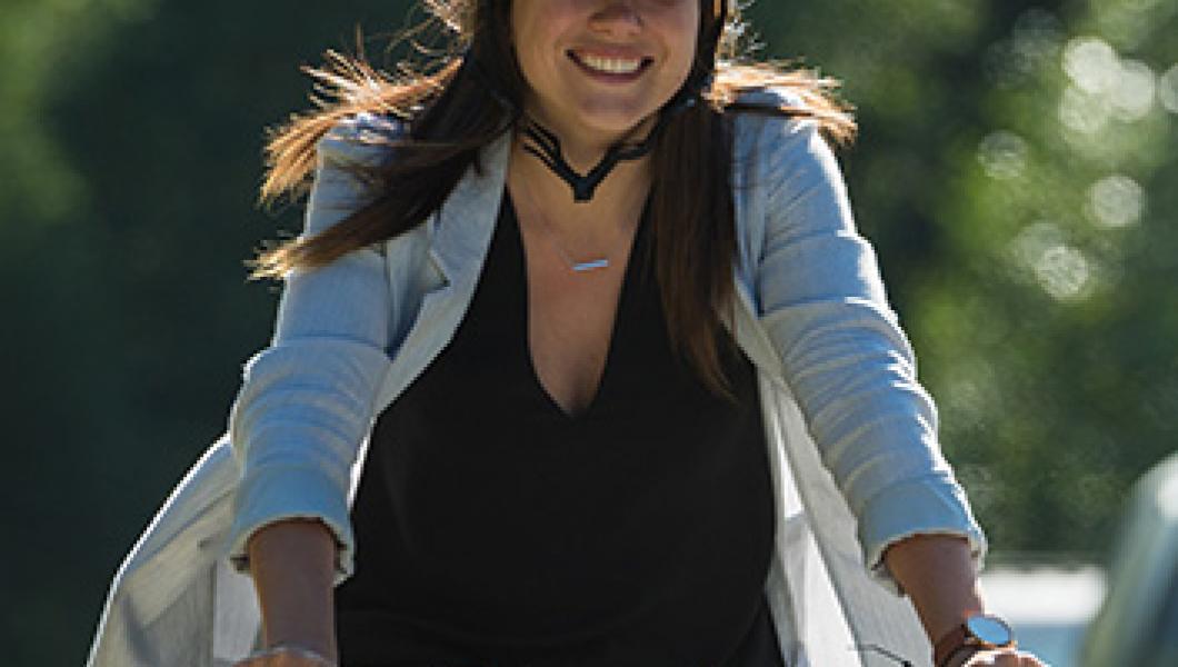 young woman riding bike