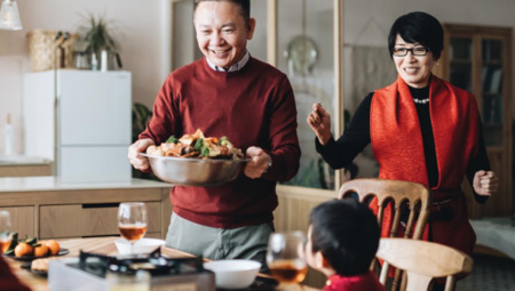 Family making dinner at home