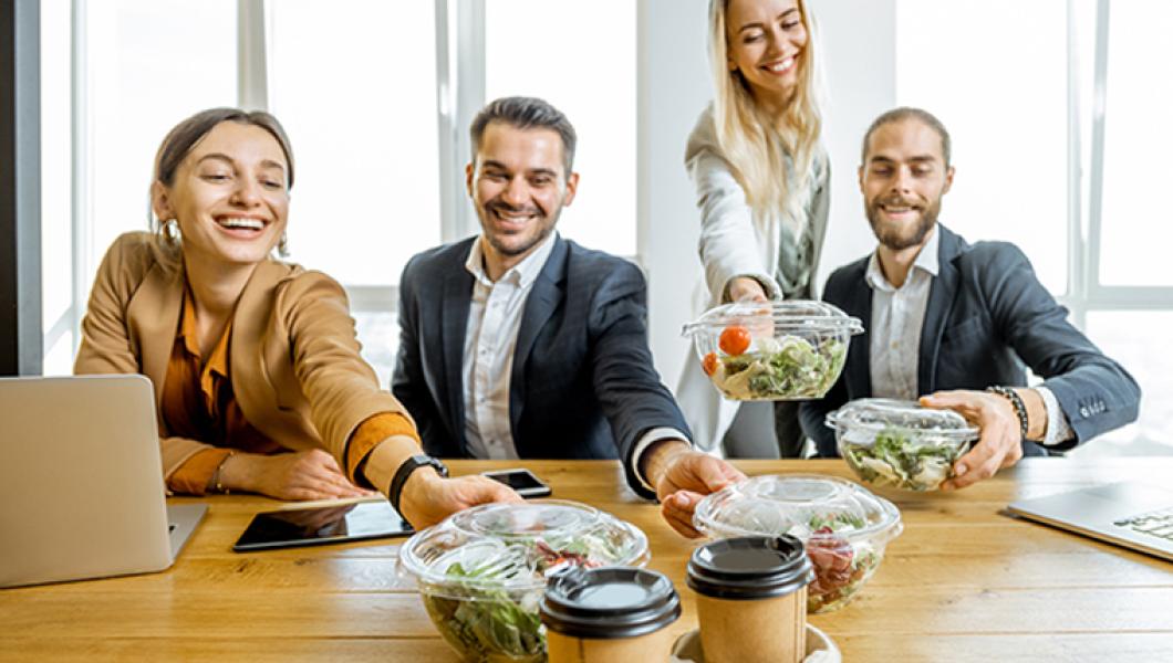 coworkers eating lunch together