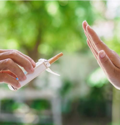 hand gesture turning down cigarette 