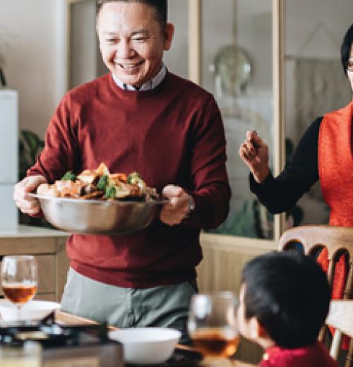 Family making dinner at home