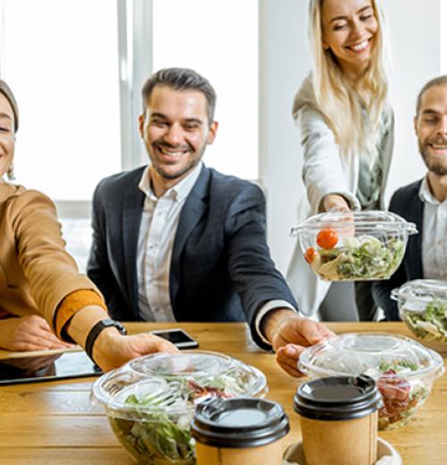 coworkers eating lunch together